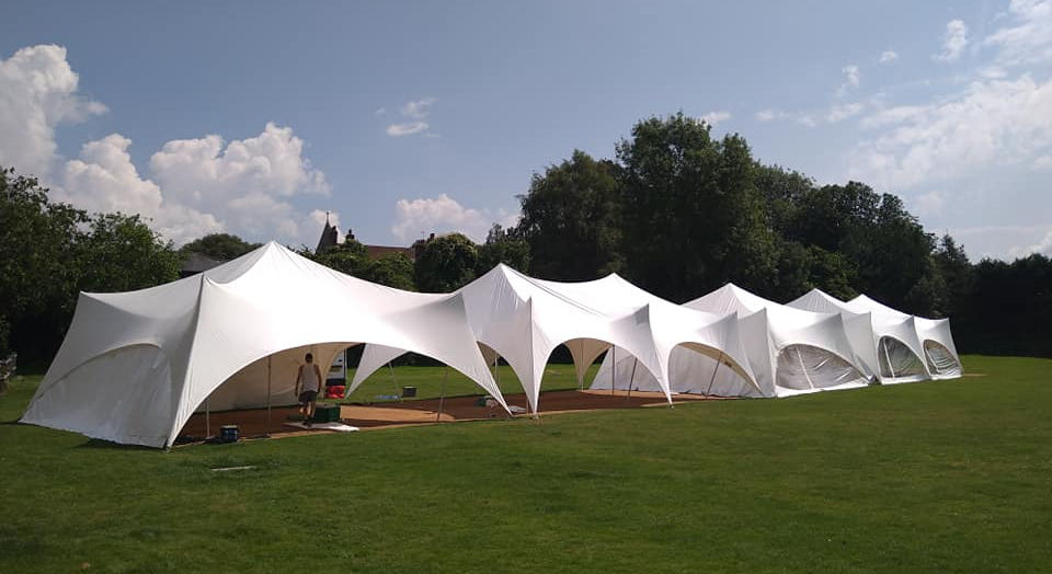 Joined Capri marquee on a lawn