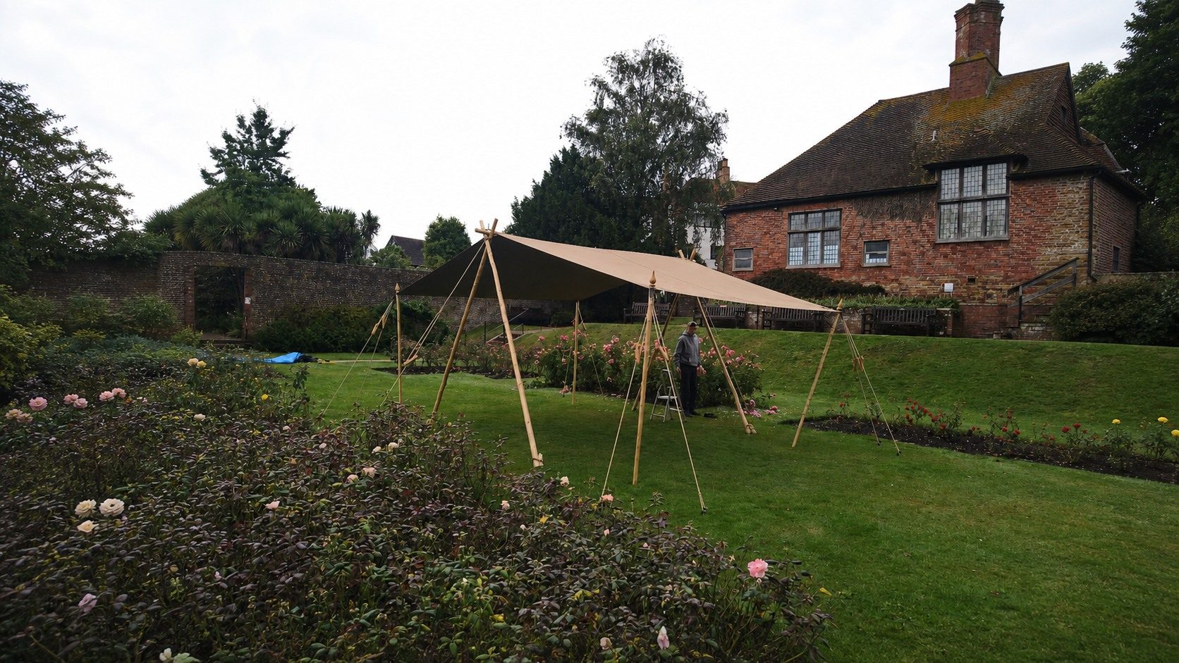 Sand canvas awning in a garden